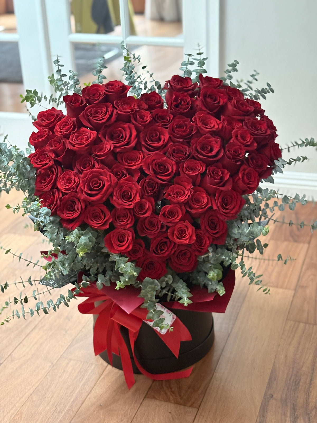 Red Rose Hatbox Arrangement with Eucalyptus