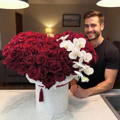 Luxury heart-shaped red rose box with white orchids in white hat box – Granada Floral Design San Diego