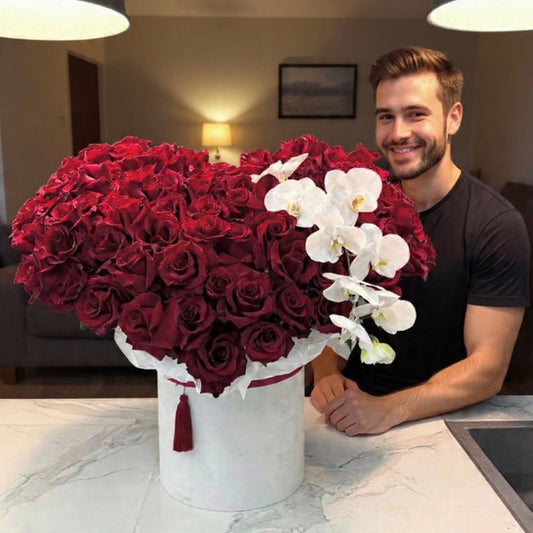 Luxury heart-shaped red rose box with white orchids in white hat box – Granada Floral Design San Diego