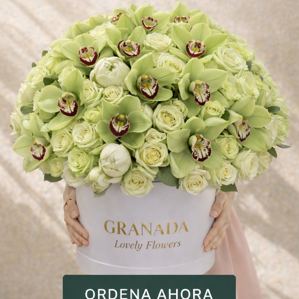 Bouquet of green flowers in a white container with 'Granada Lovely Flowers' branding.