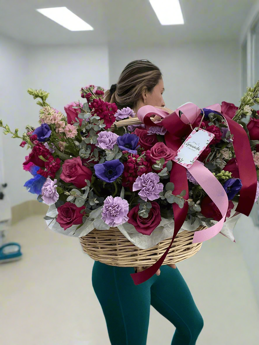 Elegant Basket with Lisianthus, Roses, Carnations & Lilacs | Seasonal Anemone Option Available.