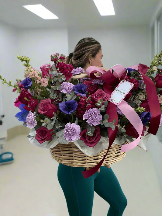 Elegant Basket with Lisianthus, Roses, Carnations & Lilacs | Seasonal Anemone Option Available.