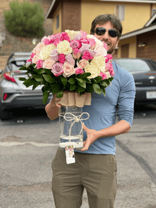 Floating roses in vase