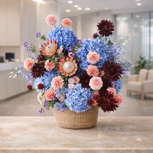 Luxury Blue Hydrangea & Protea Floral Basket – Elegant Designer Arrangement