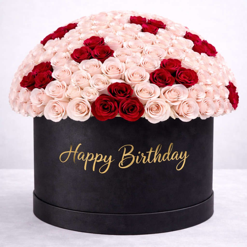 Black birthday gift box with pink and red roses on a white background