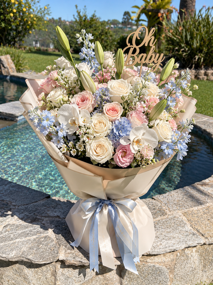 Pastel Oh Baby bouquet with blue accents