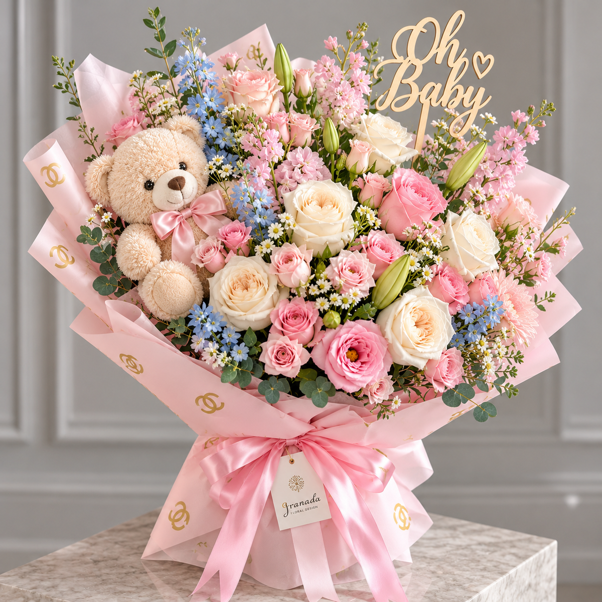 Oh Baby bouquet with teddy bear, pink and white roses and gold topper