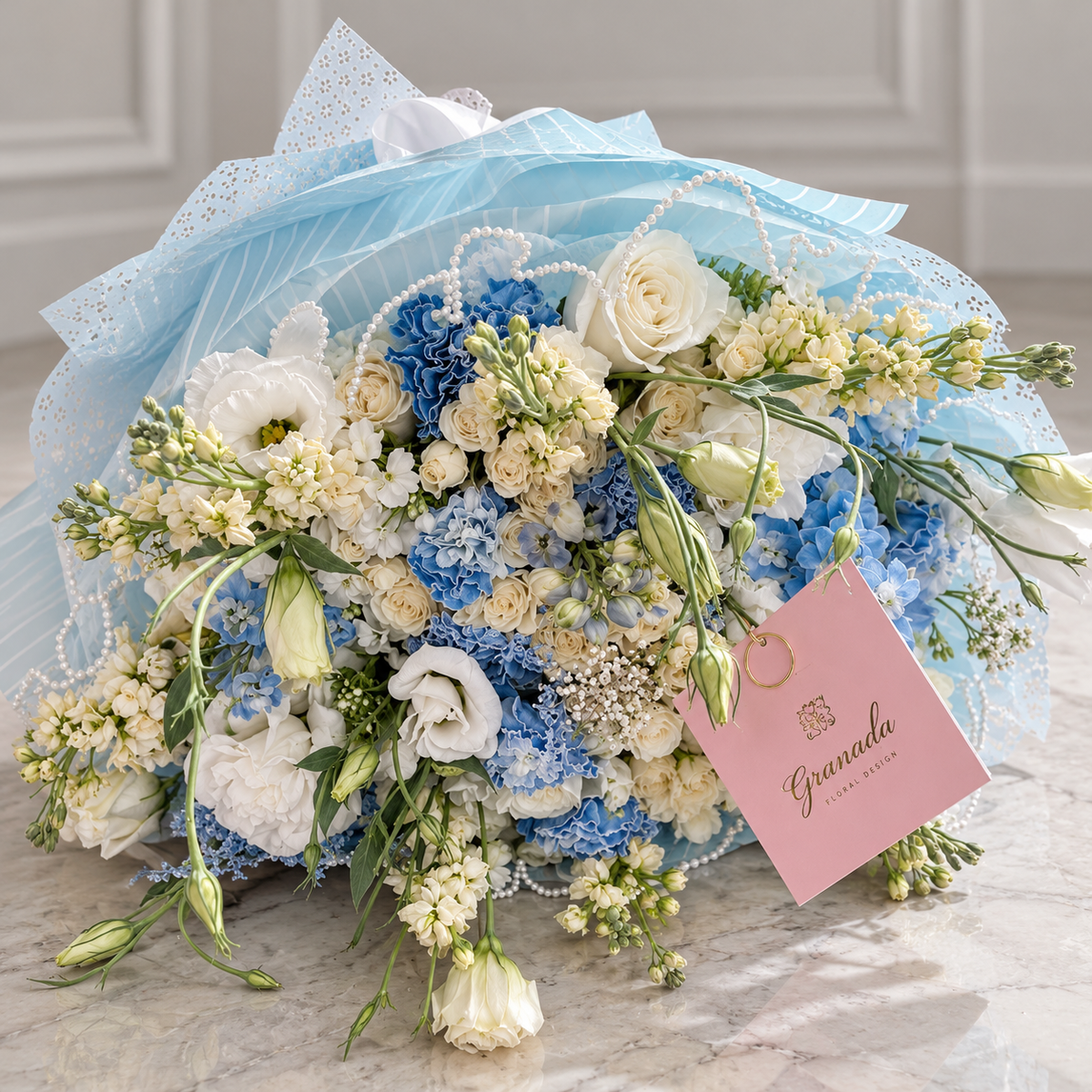 Blue and white pastel round cup bouquet for new baby Granada Floral Design San Diego
