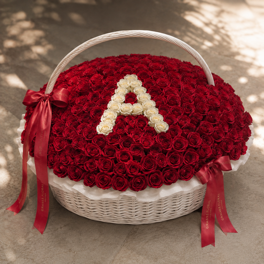 200 red roses with custom white initial A in white wicker basket – Granada Floral San Diego