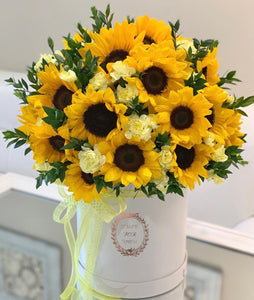 Sunflowers with carnations in box