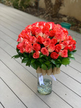 Floating roses in vase
