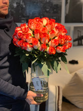 Floating roses in vase