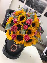 Sunflowers with carnations in box