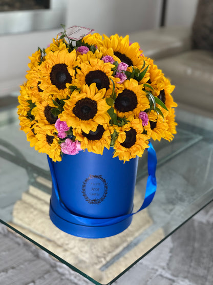 Sunflowers with carnations in box