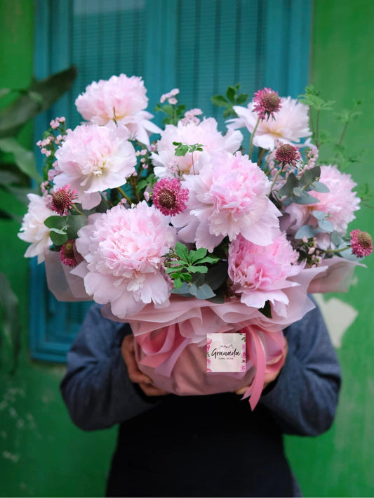 Peonies in a box